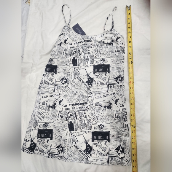 Mini newspaper print dress - a fashionably fearless find!" - Picture 4 of 5
